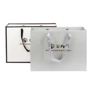 Custom Logo Printed Luxury Ivory Board Paper Bag.JPG